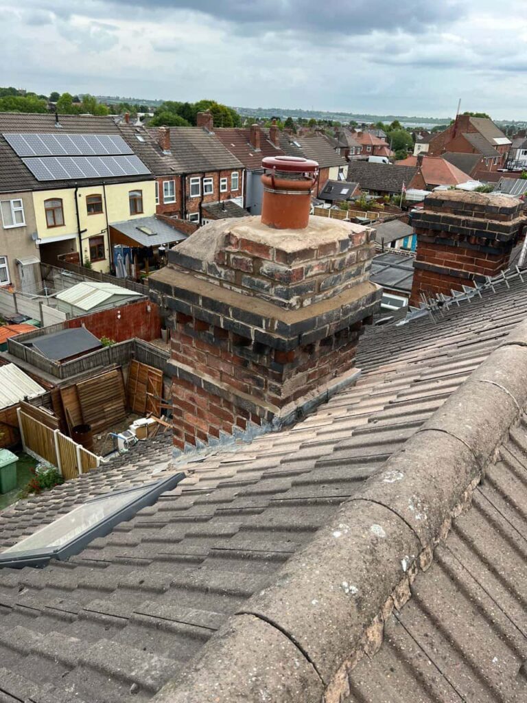 This is a photo taken from a roof which is being repaired by Calverton Roofing Repairs, it shows a street of houses, and their roofs